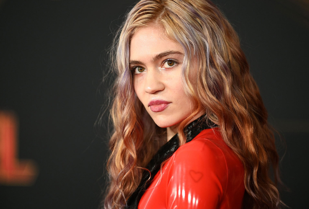 Grimes Voices Support for Lizzo Amid Controversy: "Loyalty Matters to Me"