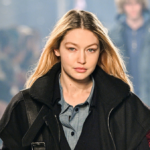 Gigi Hadid Stuns in Miu Miu Fashion Show with Neon Band-Aids on Toes